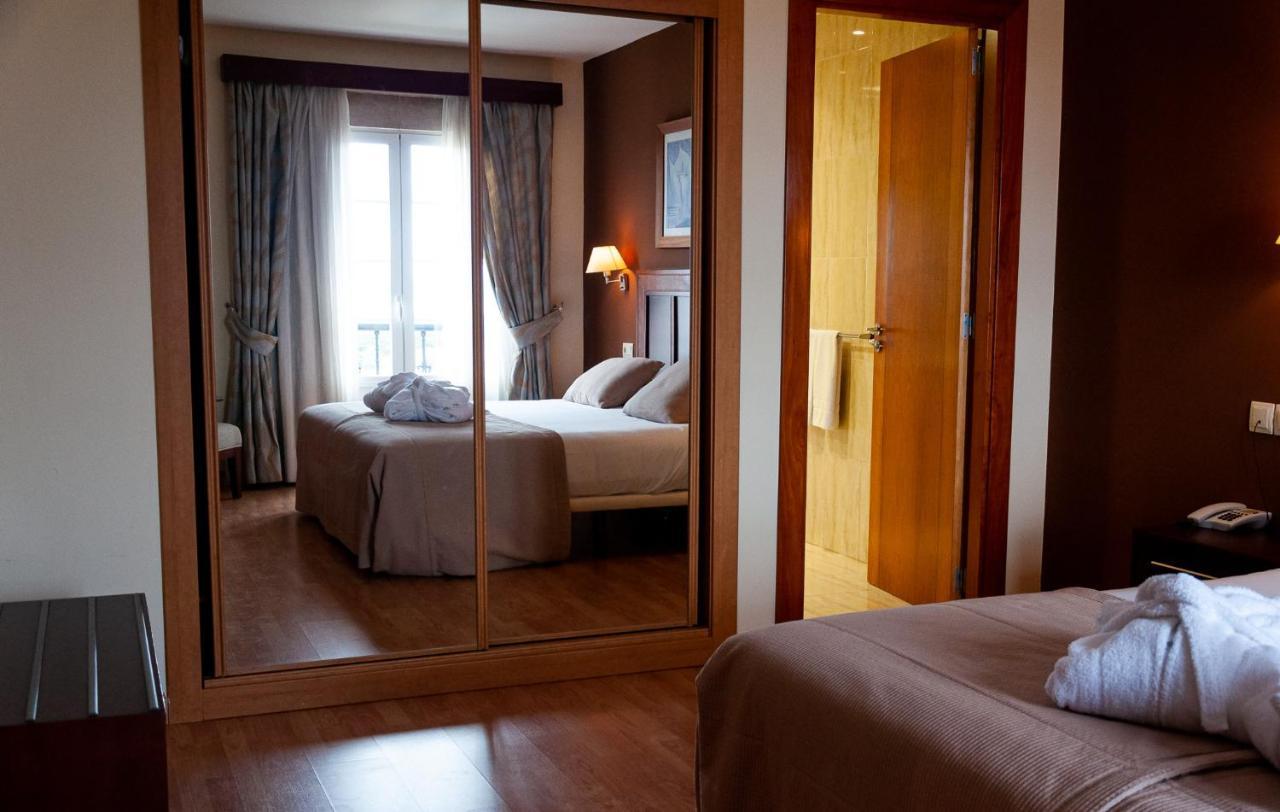 Hotel Arva Santiago León Extérieur photo